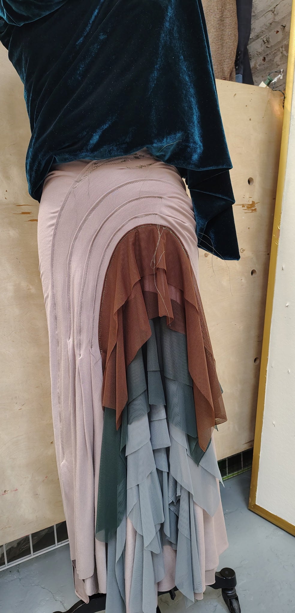 Overly lay $175
Rayon Lycra nude color stitch detail, high waist drape skirt. Flowy mesh