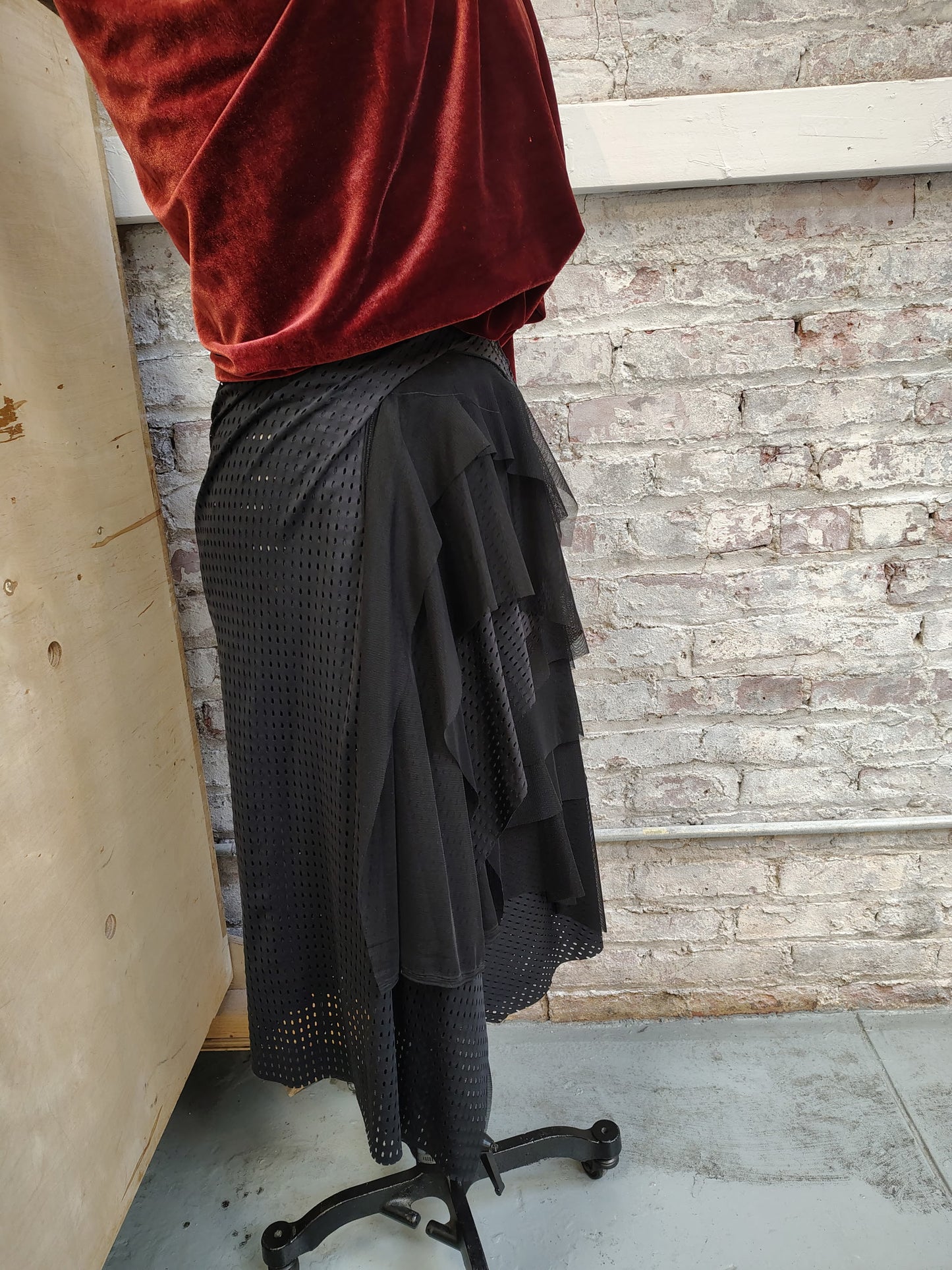 Agility size 8, $155 Black Athletic stretch fabric skirt ready for movement. Has ruching, stitch details and flowy mesh. Designed and made by Cheryl Johnston