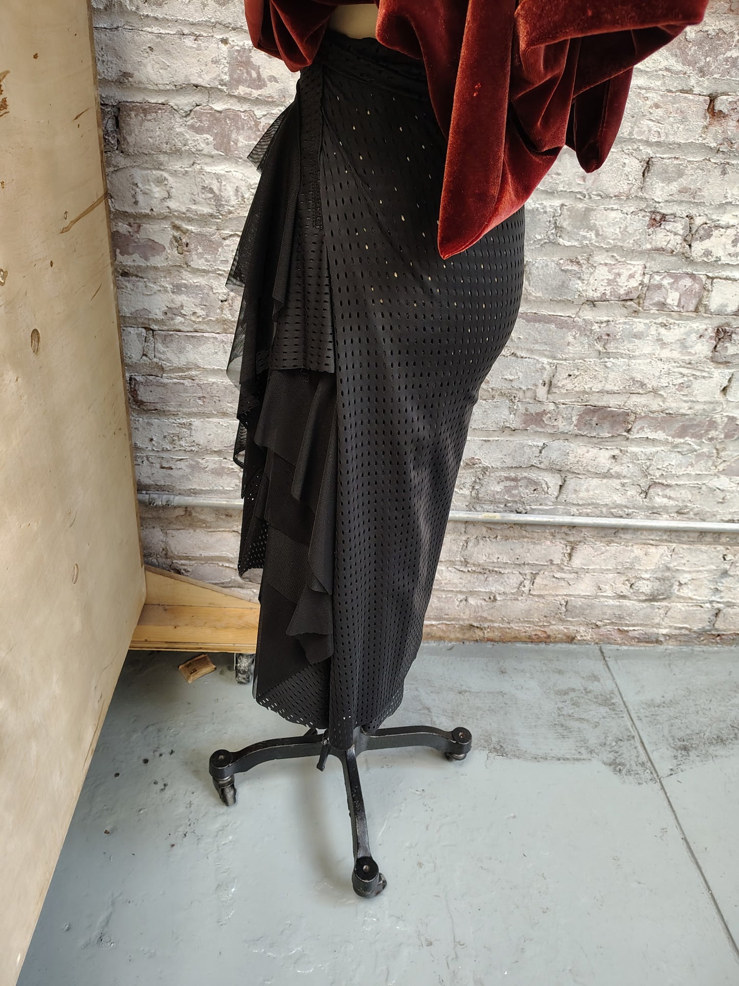Agility size 8, $155 Black Athletic stretch fabric skirt ready for movement. Has ruching, stitch details and flowy mesh. Designed and made by Cheryl Johnston
