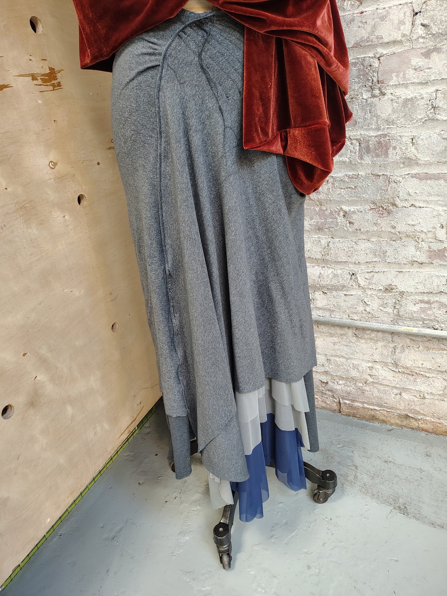 Unravel Me $135 Skirt has stitch detail with some threads hanging loosely. Size 8. Side detail and mesh