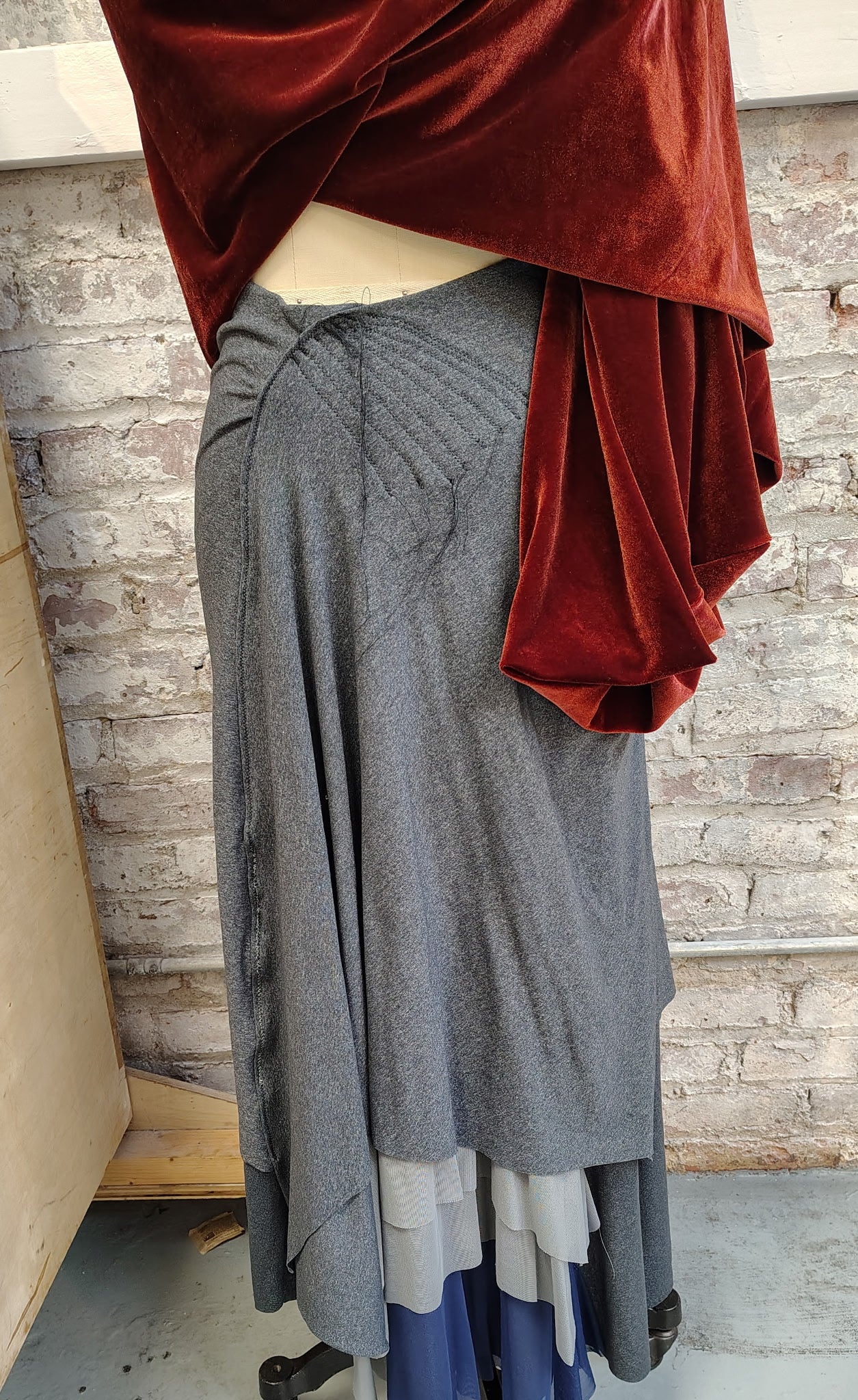 Unravel Me $135 Skirt has stitch detail with some threads hanging loosely. Size 8. Side detail and mesh