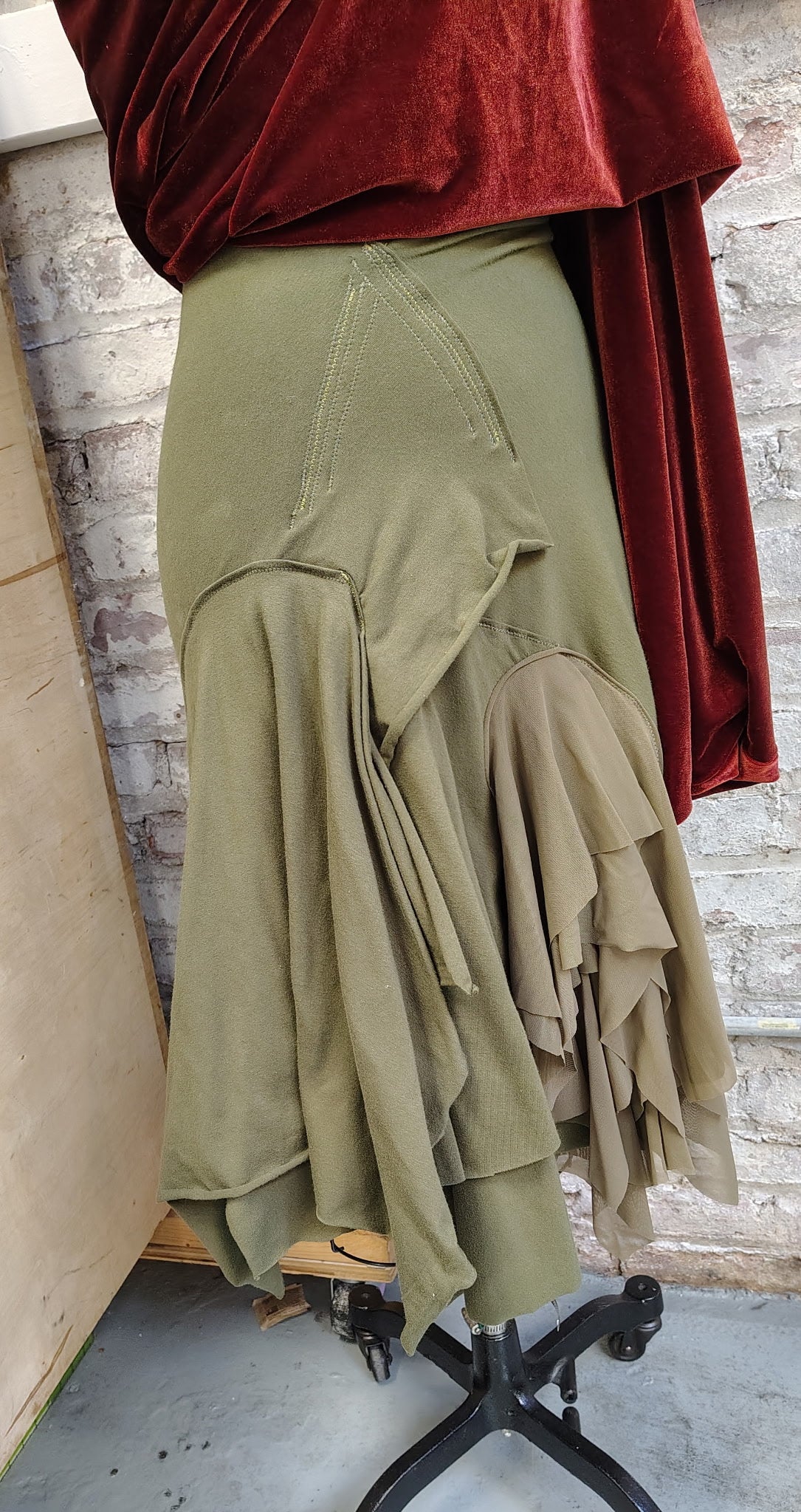 Olivia $135 Cotton Lycra knee length skirt with draping and mesh. Size 8
