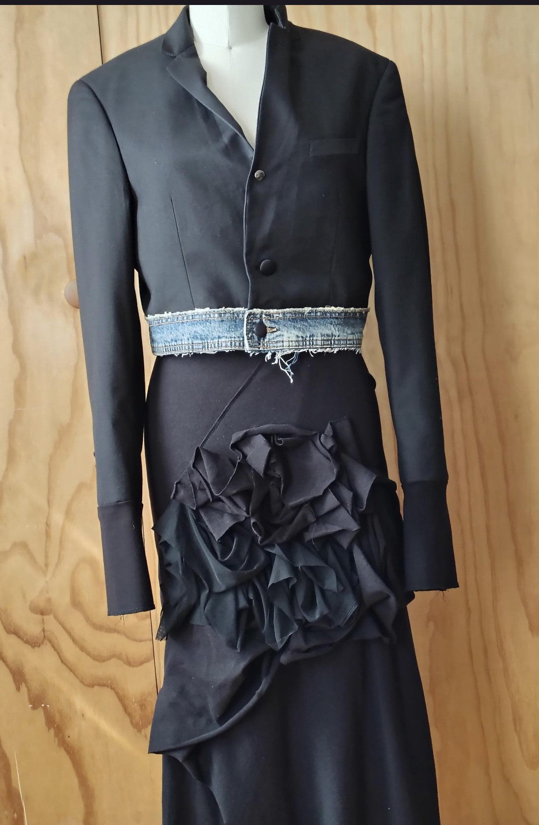 Black layered high waisted skirt in rayon Lycra with random stitch details. By Cheryl Johnston for Johnston Designs.