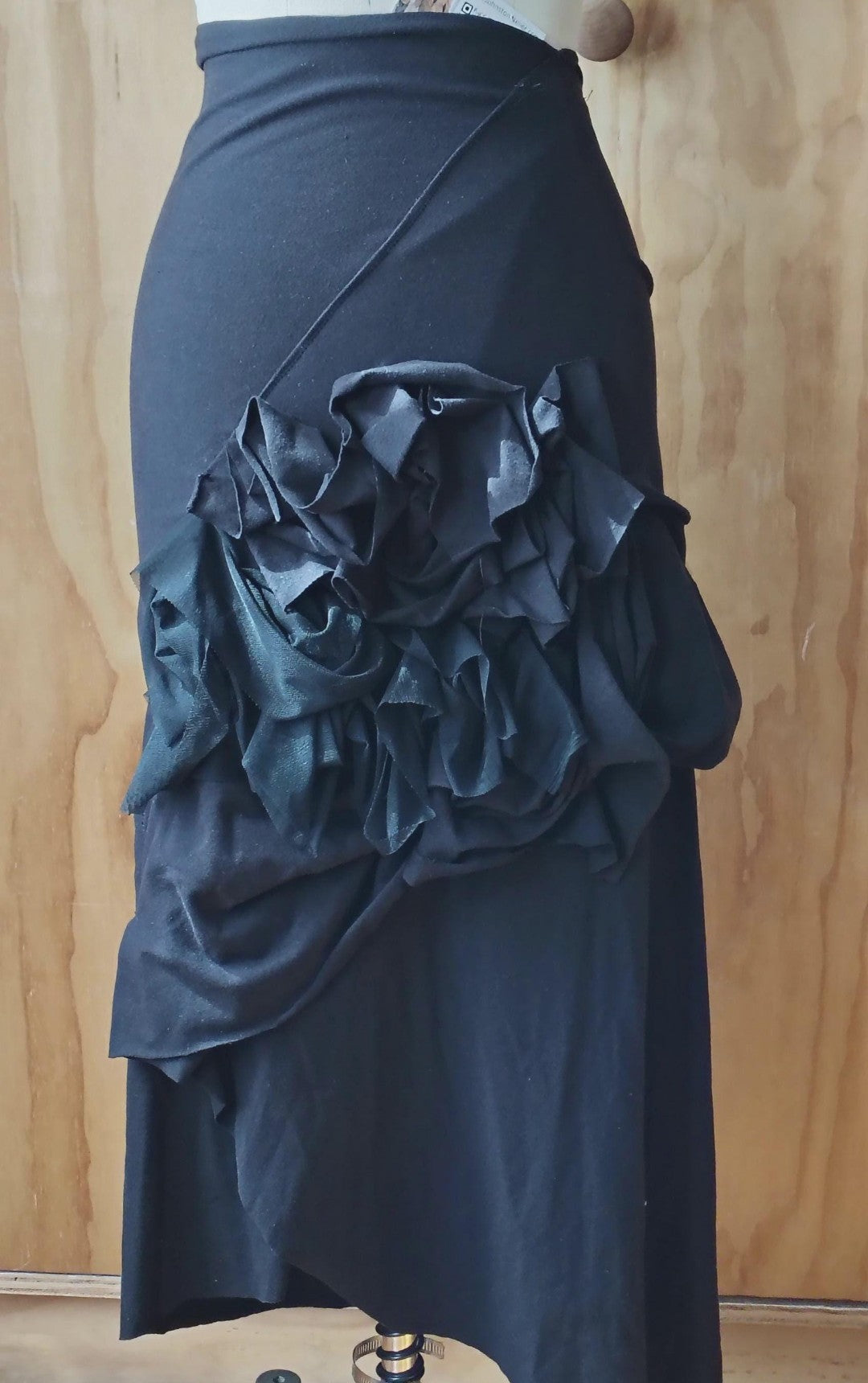 Black layered high waisted skirt in rayon Lycra with random stitch details. By Cheryl Johnston for Johnston Designs.