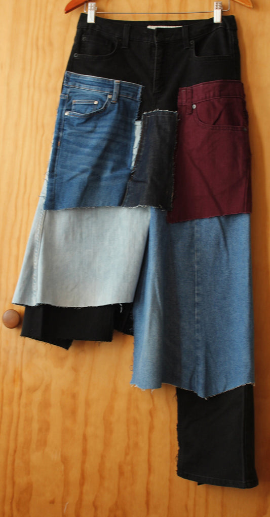 Black denim patch upcycle denim slight stretch skirt/ waist 28-31/ hip 37-40/ length 30" and long side 40"/ streetwear chic one of a kind