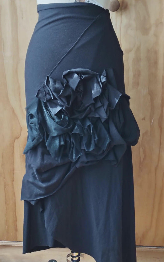 Black layered high waisted skirt in rayon Lycra with random stitch details. By Cheryl Johnston for Johnston Designs.